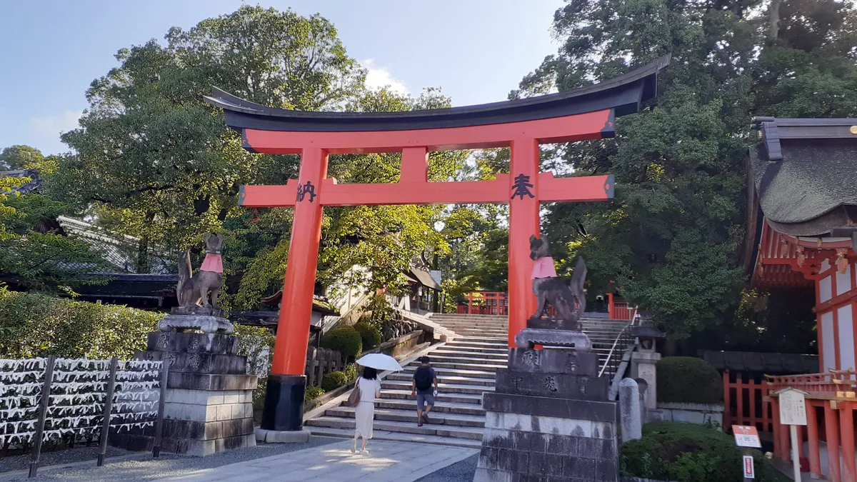 Lantern-lit torii gates at Fushimi Inari Shrine at night